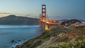 Preview wallpaper bridge, lights, slope, sea, strait