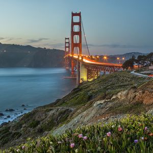 Preview wallpaper bridge, lights, slope, sea, strait