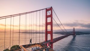 Preview wallpaper bridge, man, architecture, construction, bay