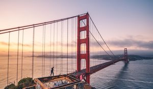 Preview wallpaper bridge, man, architecture, construction, bay