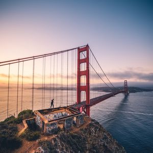 Preview wallpaper bridge, man, architecture, construction, bay