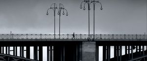 Preview wallpaper bridge, man, lights, architecture, water, black and white