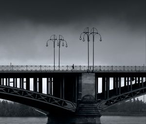 Preview wallpaper bridge, man, lights, architecture, water, black and white