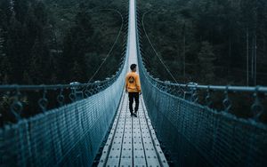 Preview wallpaper bridge, man, loneliness, cable bridge, nature