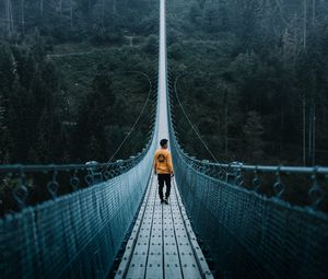 Preview wallpaper bridge, man, loneliness, cable bridge, nature