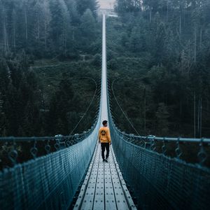 Preview wallpaper bridge, man, loneliness, cable bridge, nature