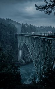 Preview wallpaper bridge, mountains, cars, evening