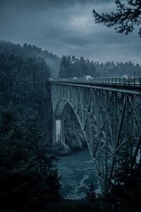 Preview wallpaper bridge, mountains, cars, evening