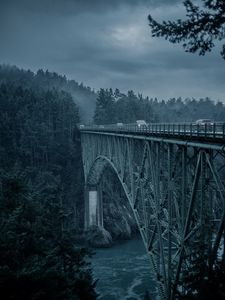 Preview wallpaper bridge, mountains, cars, evening