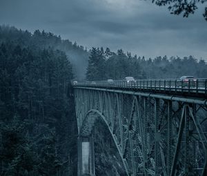 Preview wallpaper bridge, mountains, cars, evening