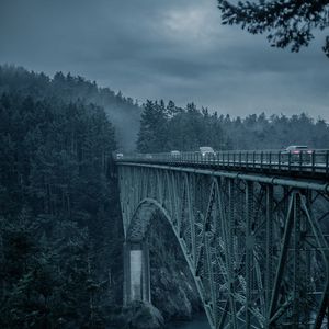 Preview wallpaper bridge, mountains, cars, evening