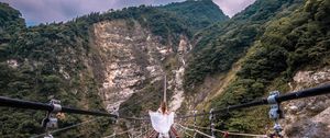 Preview wallpaper bridge, mountains, girl, solitude, walk, height