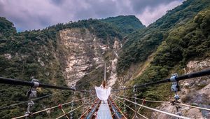 Preview wallpaper bridge, mountains, girl, solitude, walk, height