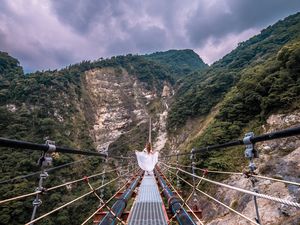 Preview wallpaper bridge, mountains, girl, solitude, walk, height