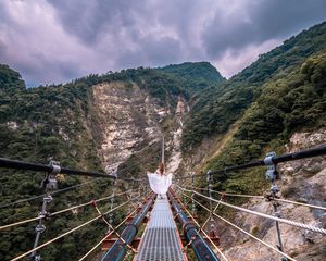 Preview wallpaper bridge, mountains, girl, solitude, walk, height