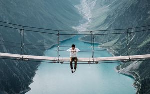 Preview wallpaper bridge, mountains, man, height, loneliness