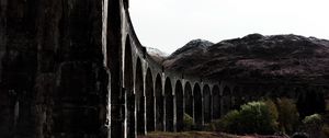 Preview wallpaper bridge, mountains, ruins