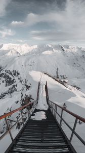 Preview wallpaper bridge, mountains, snow, peak, mountain range