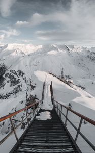 Preview wallpaper bridge, mountains, snow, peak, mountain range