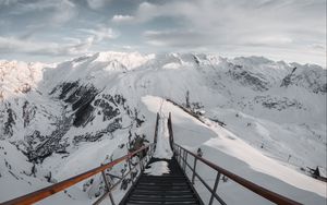 Preview wallpaper bridge, mountains, snow, peak, mountain range