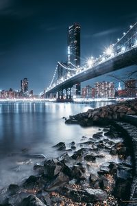 Preview wallpaper bridge, night city, coast, city lights, stones