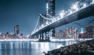 Preview wallpaper bridge, night city, coast, city lights, stones