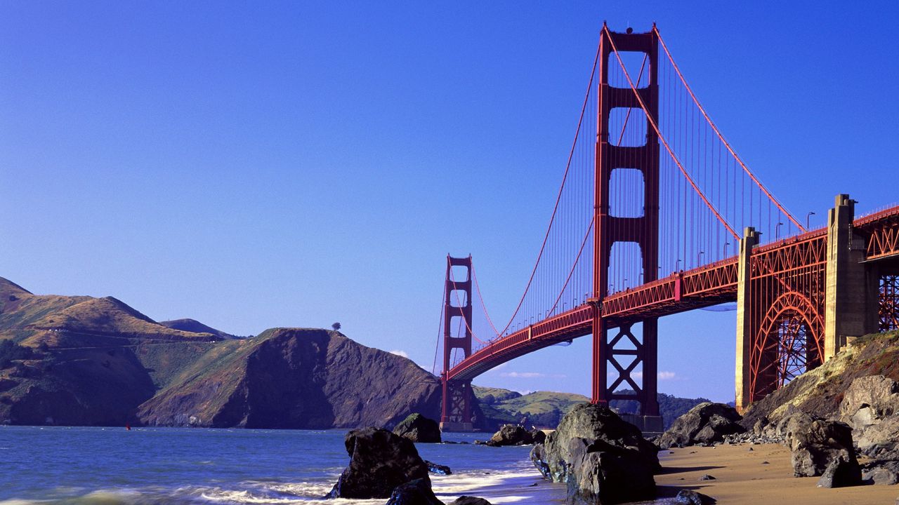 Wallpaper bridge, ocean, california, waves, rocks, blue sky, distance