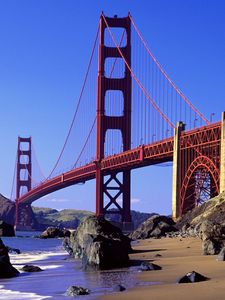 Preview wallpaper bridge, ocean, california, waves, rocks, blue sky, distance