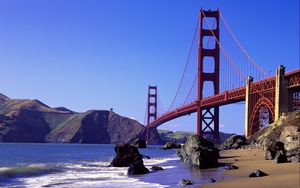 Preview wallpaper bridge, ocean, california, waves, rocks, blue sky, distance