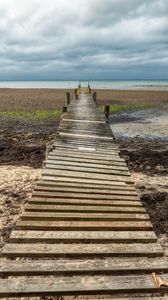Preview wallpaper bridge, pier, beach, sea, horizon, clouds, sky, landscape