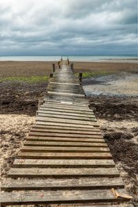 Preview wallpaper bridge, pier, beach, sea, horizon, clouds, sky, landscape
