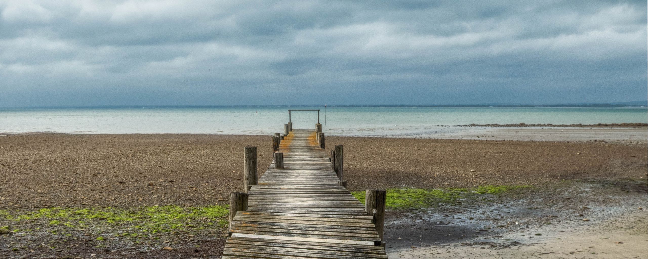 2560x1024 Wallpaper bridge, pier, beach, sea, horizon, clouds, sky, landscape