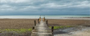 Preview wallpaper bridge, pier, beach, sea, horizon, clouds, sky, landscape