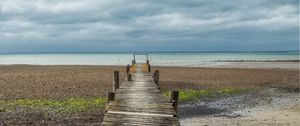 Preview wallpaper bridge, pier, beach, sea, horizon, clouds, sky, landscape