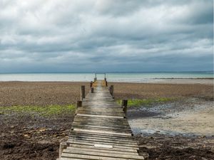 Preview wallpaper bridge, pier, beach, sea, horizon, clouds, sky, landscape