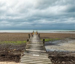 Preview wallpaper bridge, pier, beach, sea, horizon, clouds, sky, landscape