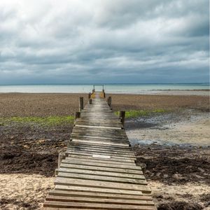Preview wallpaper bridge, pier, beach, sea, horizon, clouds, sky, landscape