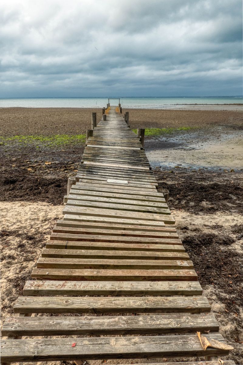 800x1200 Wallpaper bridge, pier, beach, sea, horizon, clouds, sky, landscape