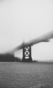 Preview wallpaper bridge, pilings, fog, sea, black and white