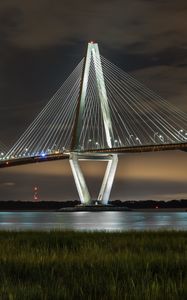 Preview wallpaper bridge, pilings, lights, glow, river, night