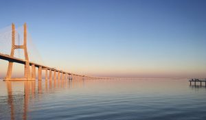 Preview wallpaper bridge, pilings, reflections, sea, sky
