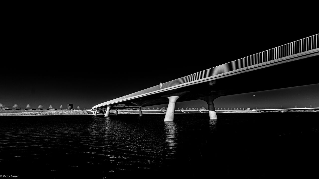 Wallpaper bridge, pilings, river, black and white