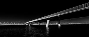 Preview wallpaper bridge, pilings, river, black and white