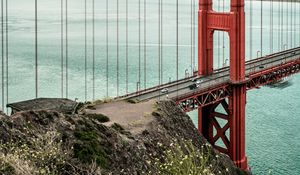 Preview wallpaper bridge, pilings, road, cars, sea