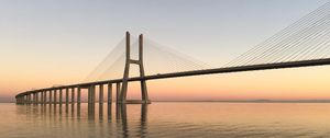 Preview wallpaper bridge, pilings, sea, sunrise