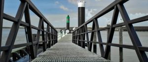 Preview wallpaper bridge, pillings, metal, sea, sky