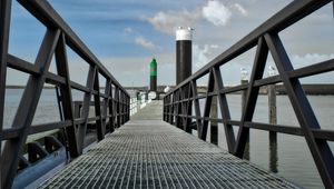 Preview wallpaper bridge, pillings, metal, sea, sky