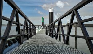 Preview wallpaper bridge, pillings, metal, sea, sky