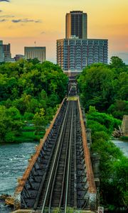 Preview wallpaper bridge, railway, river, city, sunset, landscape