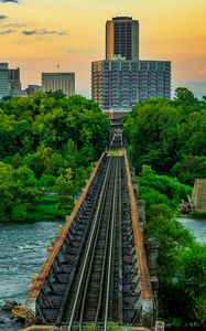 Preview wallpaper bridge, railway, river, city, sunset, landscape